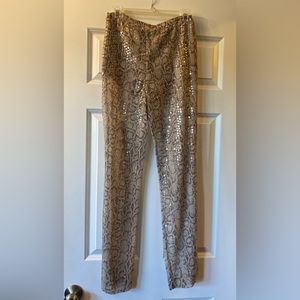 Scrupoli snake print see through pants with clear specks in the front. Sz 40
